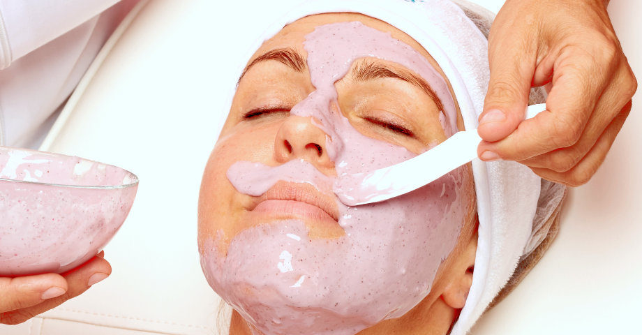 Woman receiving a facial